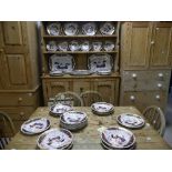 An extensive Staffordshire Dinner Service, in an imari pattern, with gadrooned rim, comprising