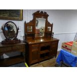 A late Victorian mirror backed Sideboard, with foliate carving, 59in 9150cm) wide, 21¼in (54cm)
