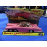 A Dinky 100 'Lady Penelope's Fab 1', on original card display stand, lacking front and rear