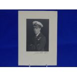 An Edward VIII signed Photograph, in Naval uniform, signed in ink ''Edward P'' as the Prince of