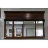 An Edwardian mahogany and darkwood Over Mantel Mirror, with central shelf above the satinwood