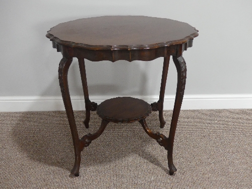 An Edwardian mahogany piecrust Occasional Table, with cabriole legs and circular undertier, 29in (