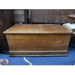 A vintage pine Blanket Box, the hinged lid enclosing a vacant interior, 41in (104cm) wide x 21½in (