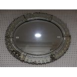 An early 20th century Italian Venetian oval Wall Mirror, with shaped and etched border, some losses,