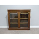 A Victorian mahogany two door glazed Bookcase, the interior with three adjustable shelves, 48in (