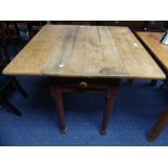 A Victorian pine Pembroke Table, with single frieze drawer and painted circular tapering legs, 35½in