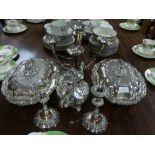 A pair of early 20thC silver plate Entree Dishes and Covers, ornately embossed with scrolling