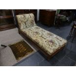 A Victorian mahogany framed Day Bed, with carved and pierced decoration, lacks castors, 72in (183cm)
