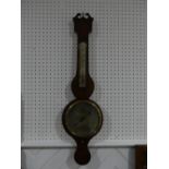 An early 19thC mahogany wheel Barometer, signed P Nolfi, Taunton with a circular silvered dial,