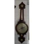 A Victorian rosewood wheel Barometer, the silvered dial signed D. Fugioli & Son, 3 Gt. Warner