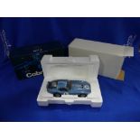 An Exoto 'Racing Legends' series 1:18 scale model of the 1964 Shelby Cobra Daytona Coupe, in blue