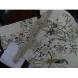 An early 20thC Chinese silk satin Wall hanging/Pelmet, the cream ground embroidered with peacocks,