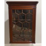 A George III astragal glazed wall-hanging Corner Cupboard, 27in (69cm) wide, 15in (38cm) deep,