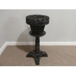 A 19thC Anglo-Indian carved ebony Plant Stand, formed of a lift-off basket shaped planter with woven