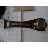 An Edwardian inlaid mahogany Barometer / Thermometer, barometer glass broken, 27in (69cm) high.