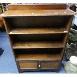 An early 20thC mahogany Open Bookcase, comprising three shelves, upon two doors, enclosing a