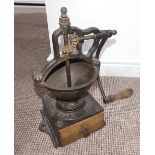 An early 20thC cast iron Coffee Grinder, by Peugeot Freres (2A) with wooden crank handle and