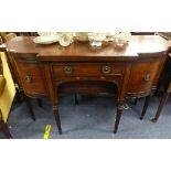 A Regency mahogany bow fronted Sideboard, with one cupboard and one deep drawer to either side of