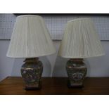 A pair of decorative Table Lamps, decorated in the Cantonese/Famille Vert style, on wooden bases,