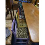 A set of twelve pine Dining Chairs, 'upcycled' in harlequin coloured paints, with animal print