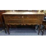 A Georgian-style oak Sideboard, comprising two short above two short drawers, all of idential