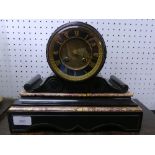 A Victorian marble and black slate 8-day barrel Mantel Clock, with a circular white dial and Roman