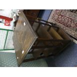 An early 20thC oak three tier revolving Bookcase, 20½in (52cm) square, 34in (87.5cm) high.