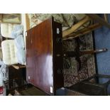 An early 19th century mahogany Reading Table, the hinged rectangular top rising as a book stand with