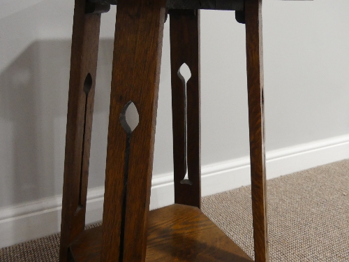 An Arts and Crafts octagonal Occasional Table, the four splayed supports carved with an Arts and - Image 3 of 3