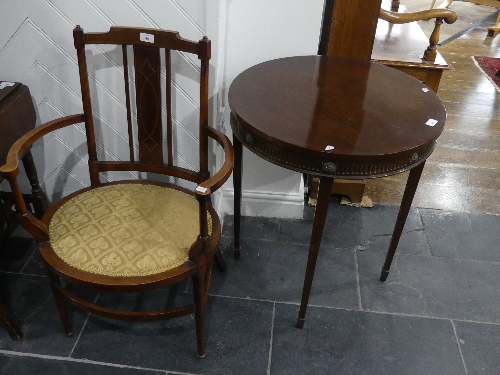 An Edwardian mahogany inlaid oval open Arm Chair, with upholstered seat, 22.5in (57cm) wide, 34in (