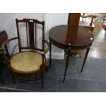 An Edwardian mahogany inlaid oval open Arm Chair, with upholstered seat, 22.5in (57cm) wide, 34in (