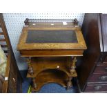 A small Edwardian walnut Desk, the brass gallery and inlaid top, enclosing leather inset, hinged lid