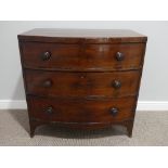 A Victorian mahogany bow front Chest of Drawers, with three long drawers, bracket feet and wooden