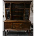 An early 20th century Oak Dresser, with leaded glass panel doors, 60in (152.5cm) wide x 79in (200.