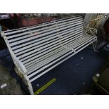 A vintage wrought iron white painted Garden Bench, with scrolled end supports and arms, metal