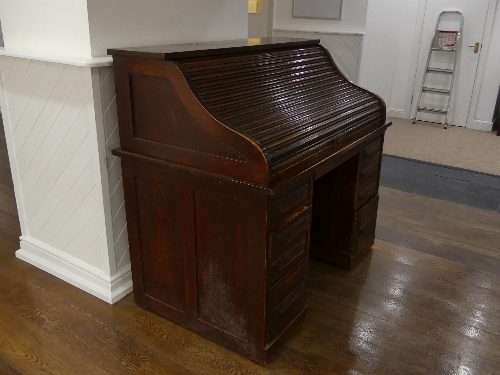 An early 20thC American oak roll top Desk, marked 'Cutler', the serpentine tambour front revealing - Image 2 of 5