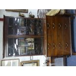A George III mahogany Bookcase, the cornice above a pair of astragal glazed doors enclosing
