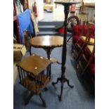 A small mahogany revolving Bookcase, on turned column with four cabriole legs, 13¾in (35cm)