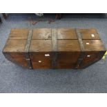 An antique iron bound oak Travelling Chest, with hinged top and tapering sides - probably to fit