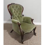 A Victorian walnut gentleman's Armchair, with leaf capped cabliole front supports, button back