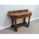 A Victorian mahogany demi-lune Dressing Table, with single frieze drawer and fluted column supports,