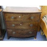 A George III mahogany bow-front Chest-of-Drawers, three long drawers with ebony stringing and