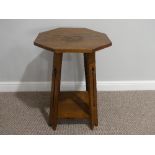 An Arts and Crafts octagonal Occasional Table, the four splayed supports carved with an Arts and