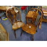 Four ash and elm Windsor type Dining Chairs, with pierced splat backs, saddle seats and crinoline