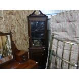 An Edwardian inlaid mahogany Corner Cupboard, the astragal glazed top with single door cupboard