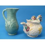 A Clarice Cliff 'Celtic Harvest' Teapot and Cover, shape no.68A, 6in (15.25cm) high, and a Clarice