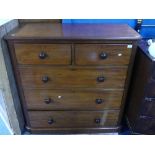 A Victorian mahogany Chest of Drawers, comprising two short above three long drawers, with turned