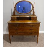 An Edwardian in-laid mahogany Dressing Table, the oval swing mirror flanked by two small drawers,