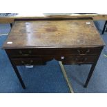 A small Victorian mahogany Desk, formerly a dressing table, 33in (84cm) wide x 17½in (44.5cm) deep.