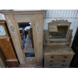 A late Victorian pine Dressing Table, with rectangular swing mirror on pierced shaped supports